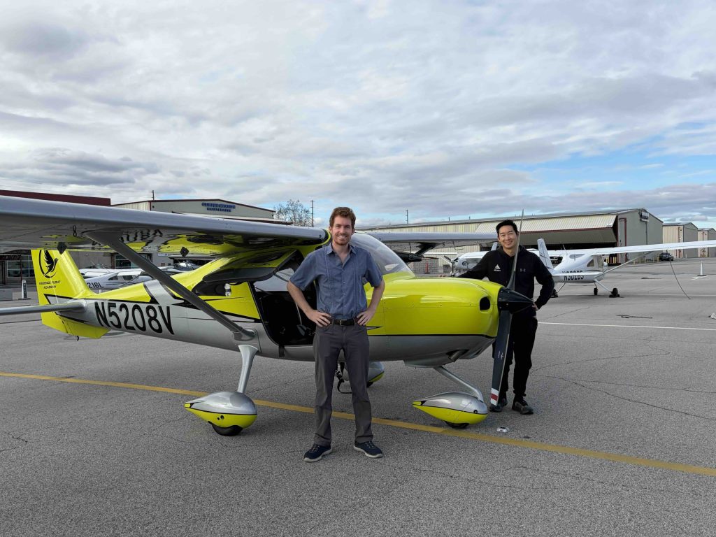 Flight School Van Nuys | Flight School | Essence Flight School | The Best Flight School Van Nuys 25 Student Pilot And Instructor Standing Beside A Cessna 162 On The Essence Flight School Ramp